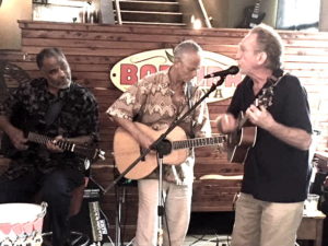 Bob playing with others at the Barriba Cantina.